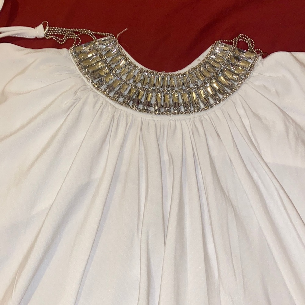 A shiny White blouse